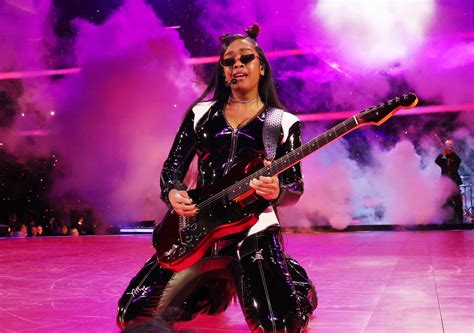 Who Was the Girl with the Guitar at the Super Bowl, and Why Did She Turn Into a Cloud of Confetti?